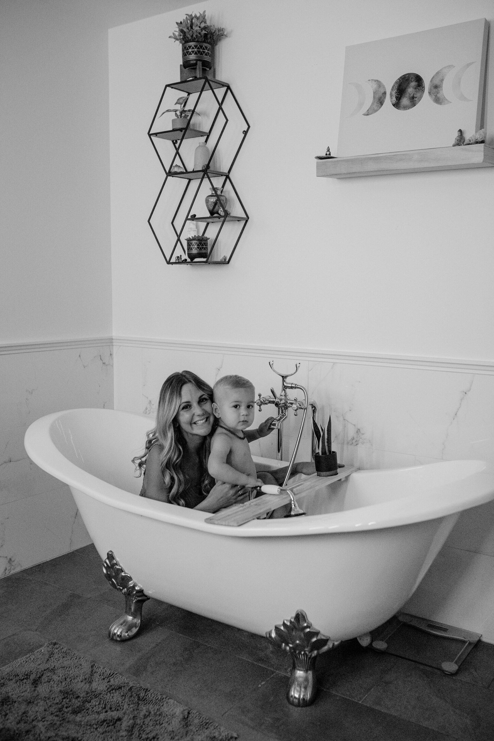 At-home family photos of a mother and son in clawfoot tub shot on film