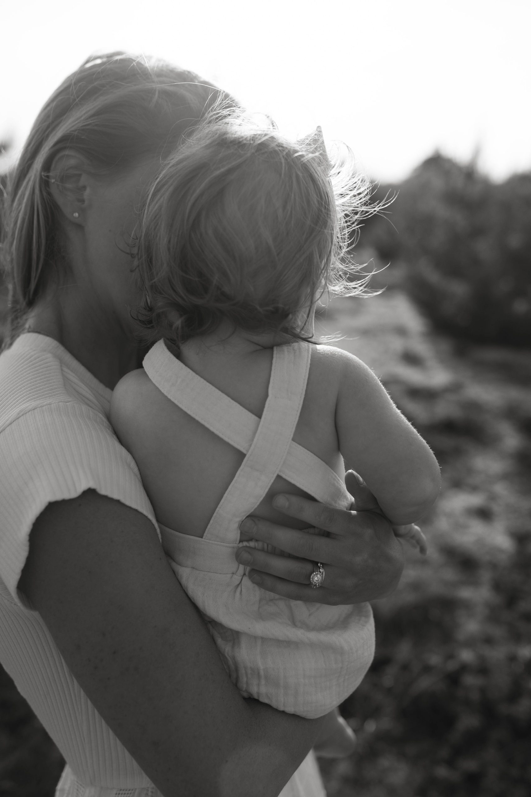 black and white raw moment mom and baby photoshoot