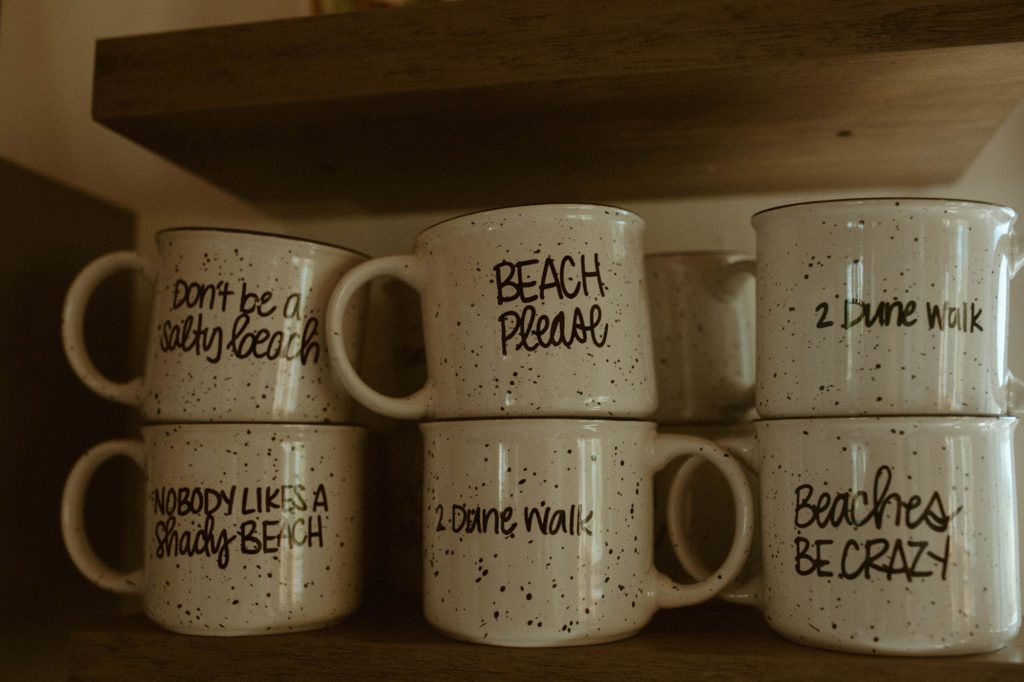 hand painted custom mugs are a perfect beachy touch in this beach house.