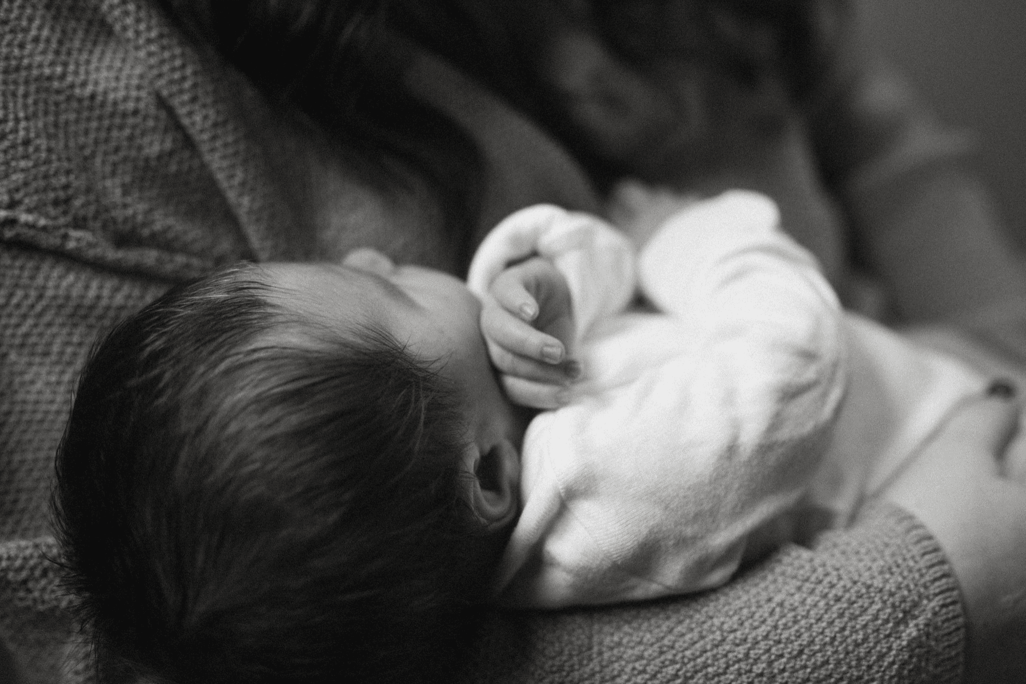 Newborn portrait. New York family photographer. Long Island maternity photographers. In home family photos. Black and white.